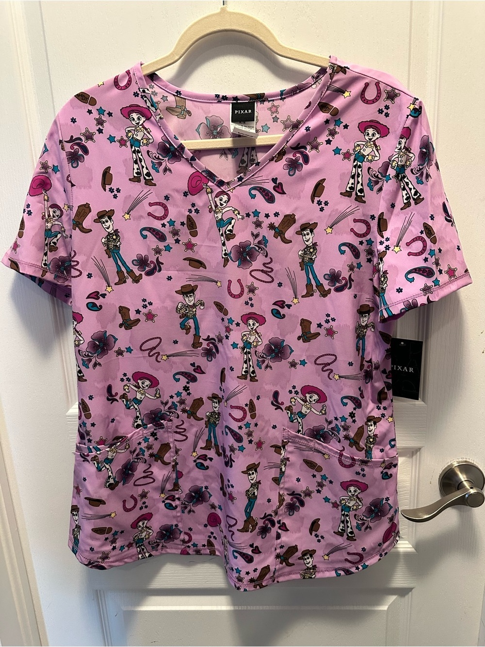 Pixar Toy Story Jessie Woody Pink Scrub Top V Neck Medical Uniform NWT